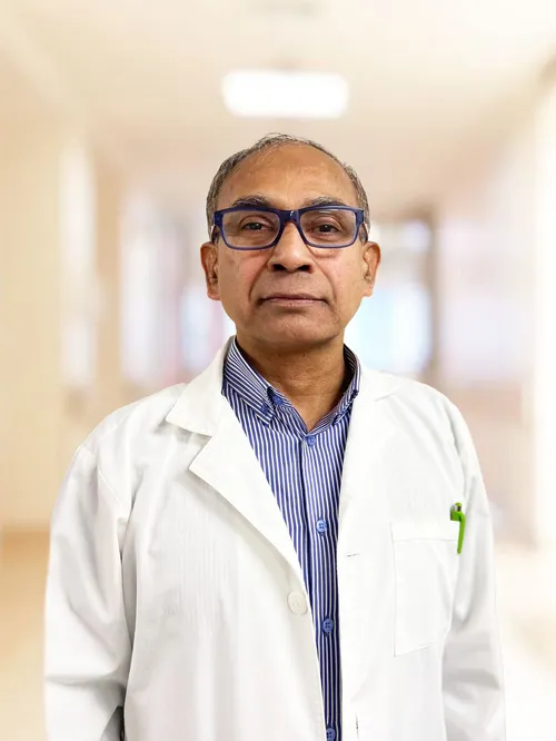 Dr. Mohammad Ashir, pediatrician, in a white coat